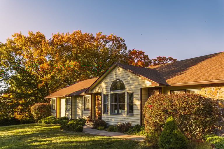 Suburban home at sunset with clean windows